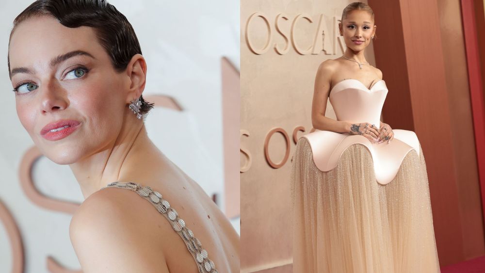 emma stone and ariana grande posing on the oscars red carpet at the Dolby Theatre on March 2, 2025