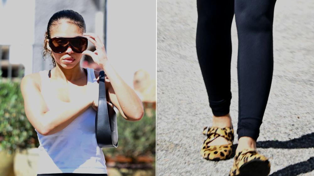Lori Harvey wearing Alaïa’s leopard haircalf Criss-Cross ballet flats with a stripped-back workout look in Los Angeles on Saturday.