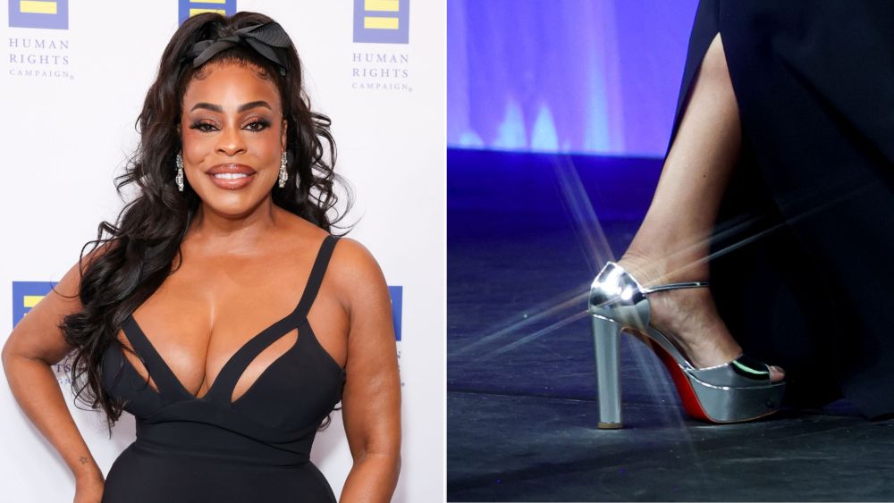 Niecy Nash wearing a pair of Christian Louboutin Sandaloo Platform Sandals in a silver mirrored finish at the Human Rights Campaign's Los Angeles Dinner on Saturday.