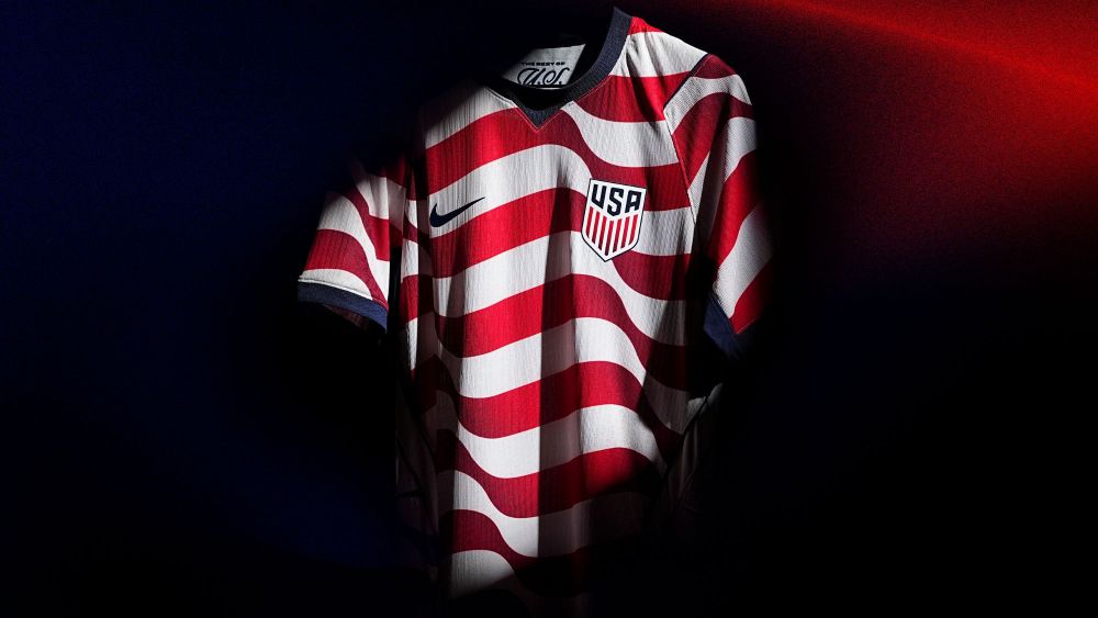 stylized photo of a U.S. men's soccer jersey, designed by Nike, with alternating stripes of red and white