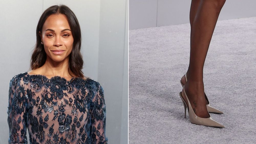 Zoe Saldaña wearing Saint Laurent P.A.R.I.S. pumps in patent leather at the 2026 Vanity Fair Oscars Party at LACMA.