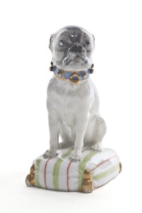 Pug on a cushion - Berlin Manufactory, Germany, circa 1760. Hard-paste porcelain, polychrome, gilding. Mark under the base: blue sceptre.
