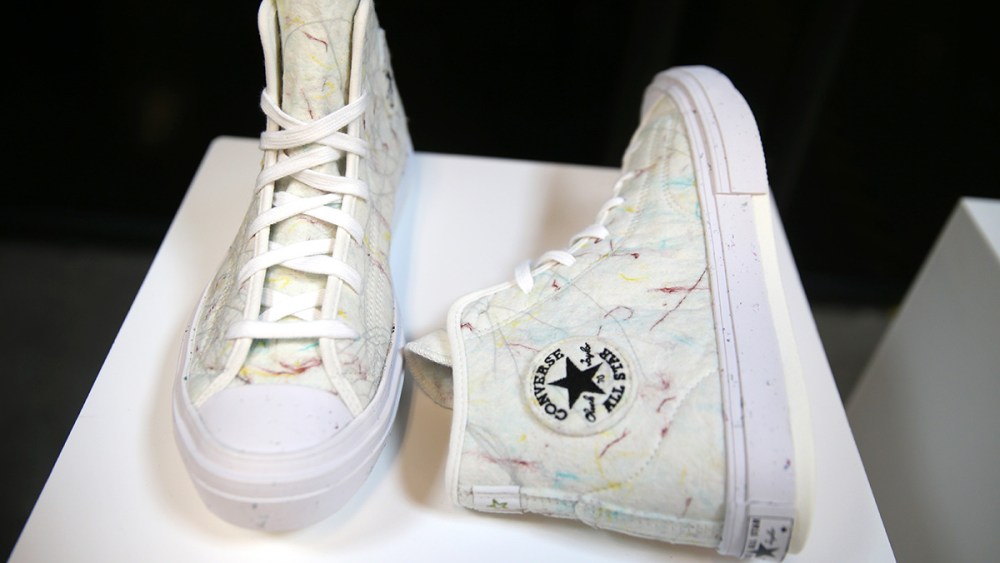 Charlestown, MA - December 6: Converse Chuck Taylor sneakers on display at the Converse Concept Creation Center. This pair was made using a process called scrap punch, which turns cloth waste into mottled felt. (Photo by Jonathan Wiggs/The Boston Globe via Getty Images)