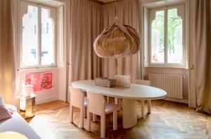 In the main "pink room" she used patchwork offcuts to create a jovial imperfect spherical shape that can be hung from the ceiling. The curation includes Tacchini's new 1809 floor light, the Gianfranco Frattini Grand Sesann sofa and the Torii Love table by Studio Pepe finished in matte powder and pink lacquer.