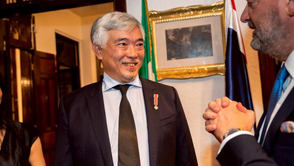 Tos Chirathivat with Paolo Dionisi, Italy's ambassador in Thailand.
