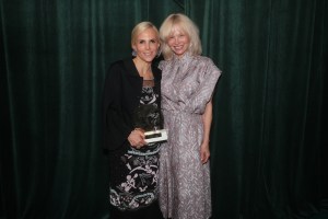 Tory Burch and Pamela Anderson pose with the Designer of the Year Award at Fashion Trust U.S. Awards 2026 held at Nya Studios West on April 07, 2026 in Los Angeles, California.