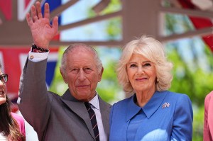 FRONT ROYAL, VIRGINIA - APRIL 30: King Charles III and Queen Camilla wave during a parade and community block party on April 30, 2026 in Front Royal, Virginia. King Charles III and Queen Camilla visited the nation's capital, New York City, and Virginia during the trip arranged to celebrate the United States of America's 250th anniversary of its independence. (Photo by Aaron Chown-Pool/Getty Images)