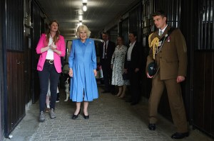 THE PLAINS, VIRGINIA - APRIL 30: Smitten Farm manager Hunter Marek walks with Queen Camilla at Smitten Farm on the final day of the state visit of King Charles III and Queen Camilla on April 30, 2026 in The Plains, Virginia. King Charles III and Queen Camilla visited the nation's capital, New York City, and Virginia during the trip arranged to celebrate the United States of America's 250th anniversary of its independence. (Photo by Kevin Dietsch/Getty Images)