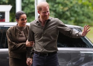 MELBOURNE, AUSTRALIA - APRIL 14: Prince Harry, Duke of Sussex and Meghan, Duchess of Sussex arrive at the Australian National Veterans Arts Museum (Anvam) in Southbank on April 14, 2026 in Melbourne, Australia. Meghan and Prince Harry, Duke of Sussex are on a four-day visit to Australia, with engagements across Melbourne, Canberra and Sydney. (Photo by Jonathan Brady-Pool/Getty Images)