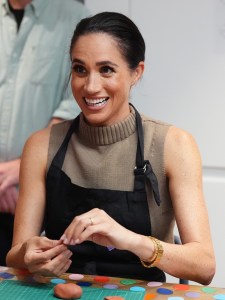 MELBOURNE, AUSTRALIA - APRIL 14: Meghan, Duchess of Sussex takes part in a model making activity with veterans and their families at the Australian National Veterans Arts Museum (Anvam) in Southbank on April 14, 2026 in Melbourne, Australia. Meghan and Prince Harry, Duke of Sussex are on a four-day visit to Australia, with engagements across Melbourne, Canberra and Sydney. (Photo by Jonathan Brady-Pool/Getty Images)