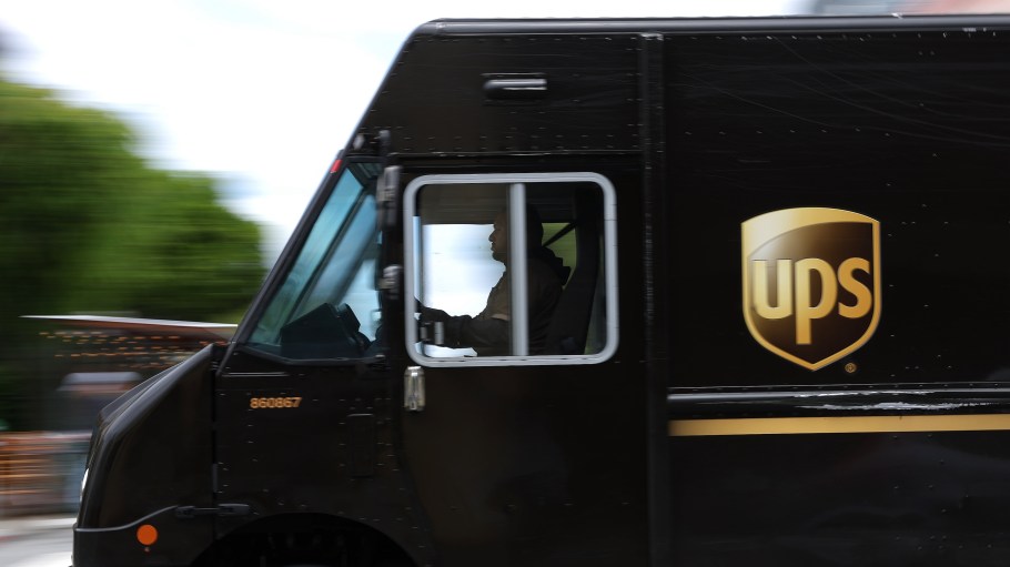 UPS and the union settled their dispute over a driver separation program, limiting the total voluntary buyouts to 7,500 employees.