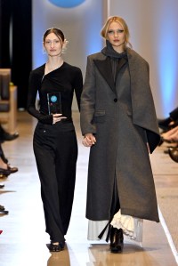 Designer Marina Malkhaslan and a model walk the runway during the FIT's 2026 Future of Fashion runway show on May 07, 2026 in New York City.