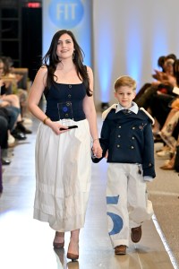 Designer Charlotte Falkman and a model walk the runway during the FIT's 2026 Future of Fashion runway show on May 07, 2026 in New York City.