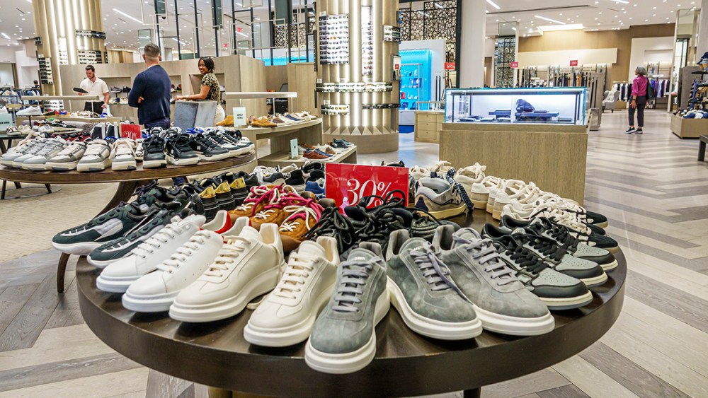 Miami, Florida, Brickell Financial District, Brickell City center shopping mall, Saks Fifth Avenue department store, designer men's sneakers on display, 30% off sale sign. (Photo by: Jeffrey Greenberg/Universal Images Group via Getty Images)