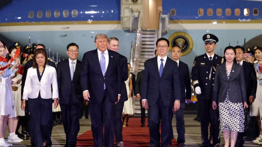 President Donald Trump with Chinese Executive Vice Minister of Foreign Affairs Ma Zhaoxu, U.S. Ambassador to China David Perdue, Vice President of China Han Zheng and Chinese Ambassador to the U.S. Xie Feng as he arrives at Beijing Capital International Airport on May 13, 2026 in Beijing, China.